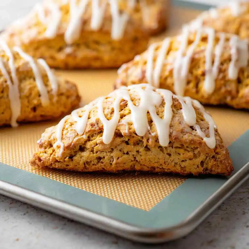 Easy Pumpkin Scones Recipe – Fluffy, Moist, and Perfect for Fall 6 Served easy pumpkin scones with maple glaze